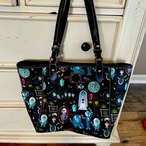 Like new Disney Dooney & Bourke haunted mansion
